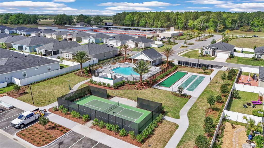 7651 Southwest 74th Loop Ocala, FL 34481 - Photo 4 of 47 an aerial view of residential houses with outdoor space
