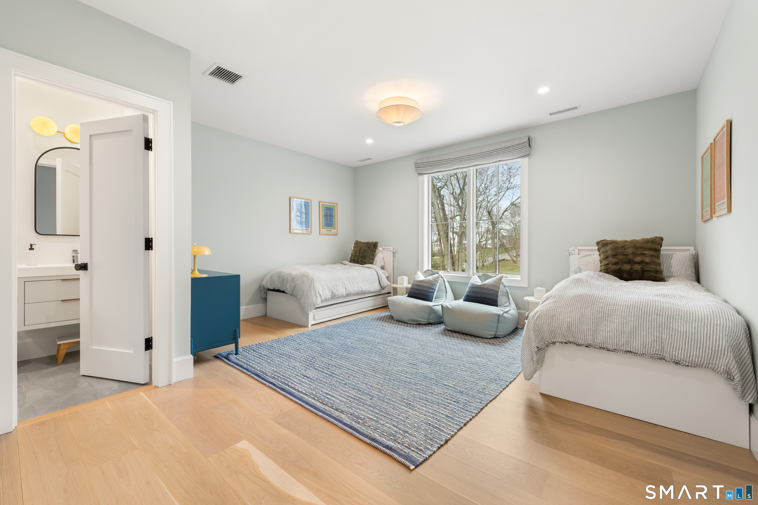 19 Mortar Rock Road Westport, CT 06880 - Photo 24 of 33 a bedroom with furniture and a couch