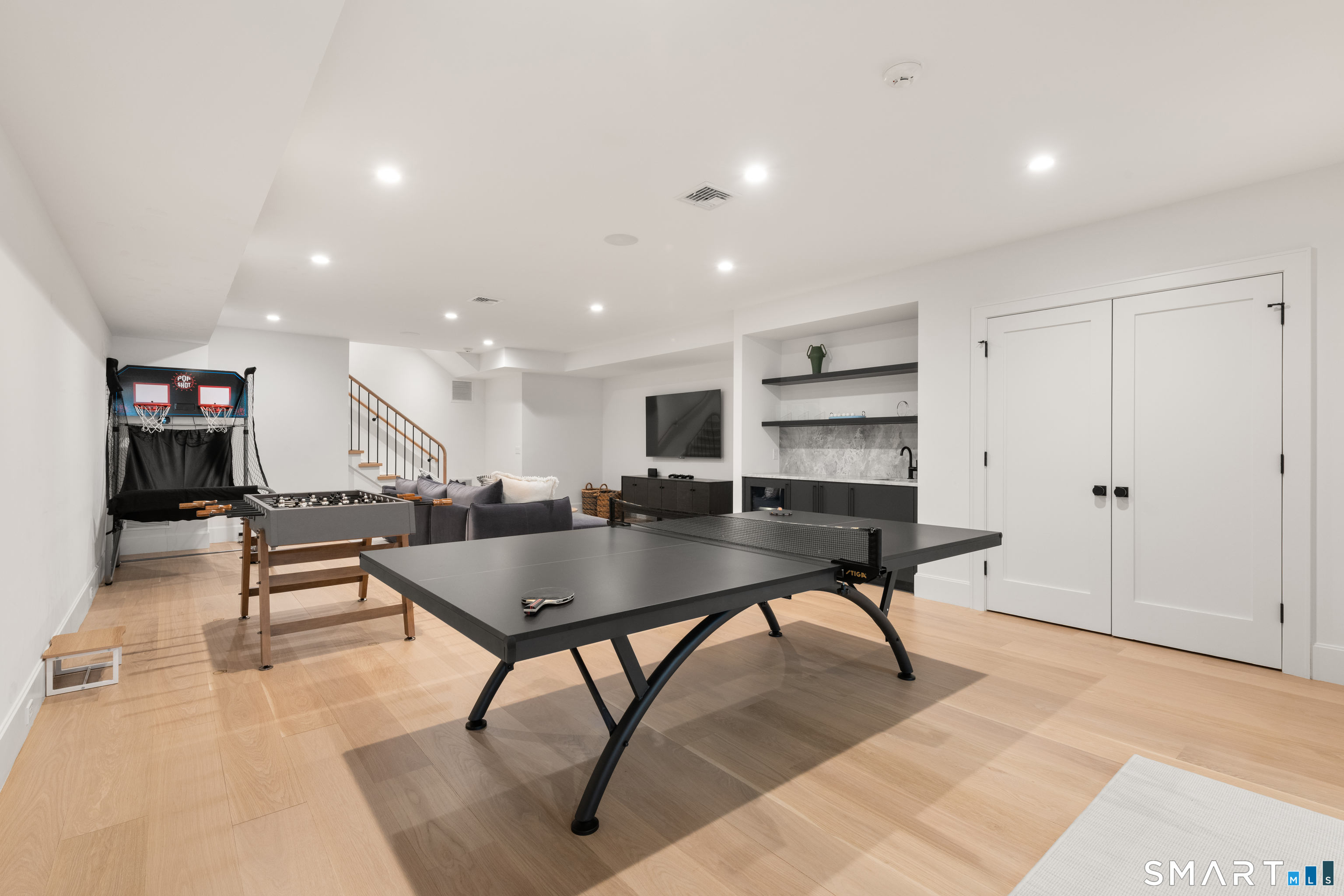 19 Mortar Rock Road Westport, CT 06880 - Photo 27 of 33 a living room with furniture and a table