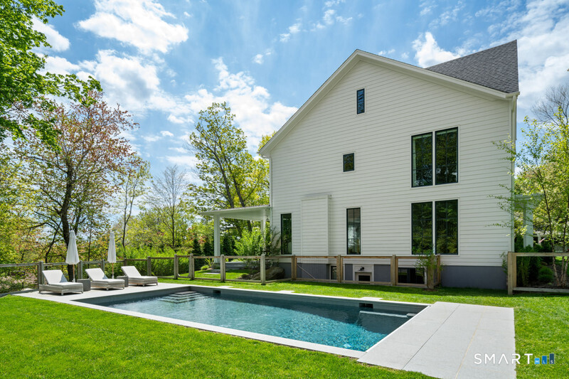 19 Mortar Rock Road Westport, CT 06880 - Photo 30 of 33 a front view of house with yard and green space