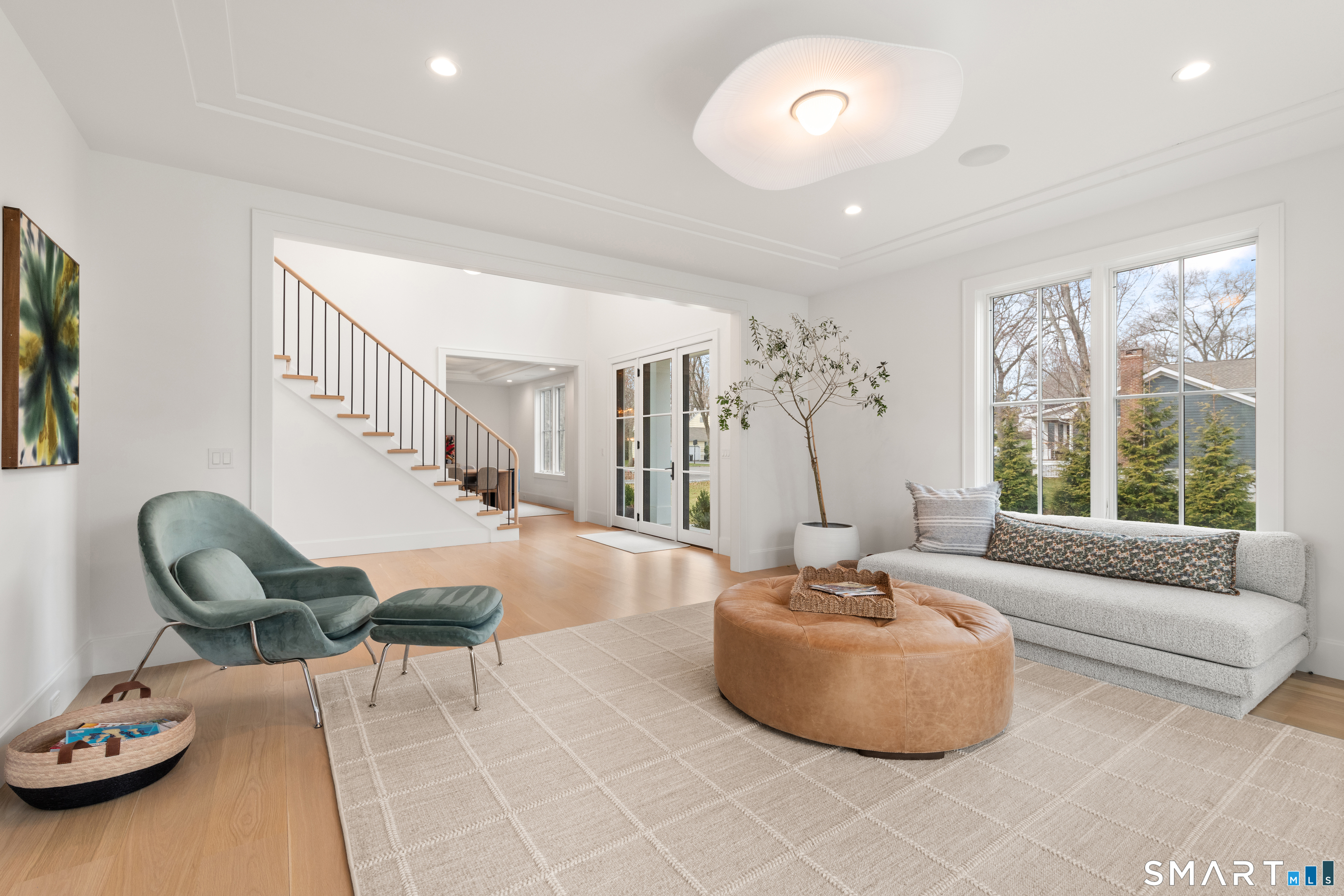 19 Mortar Rock Road Westport, CT 06880 - Photo 3 of 33 a living room with furniture and a large window