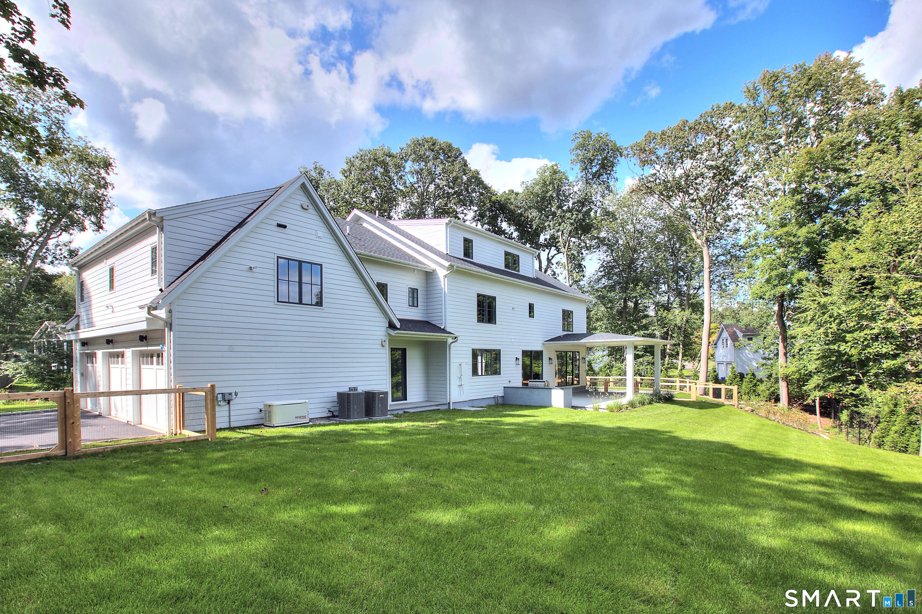 19 Mortar Rock Road Westport, CT 06880 - Photo 33 of 33 a front view of house with yard and green space