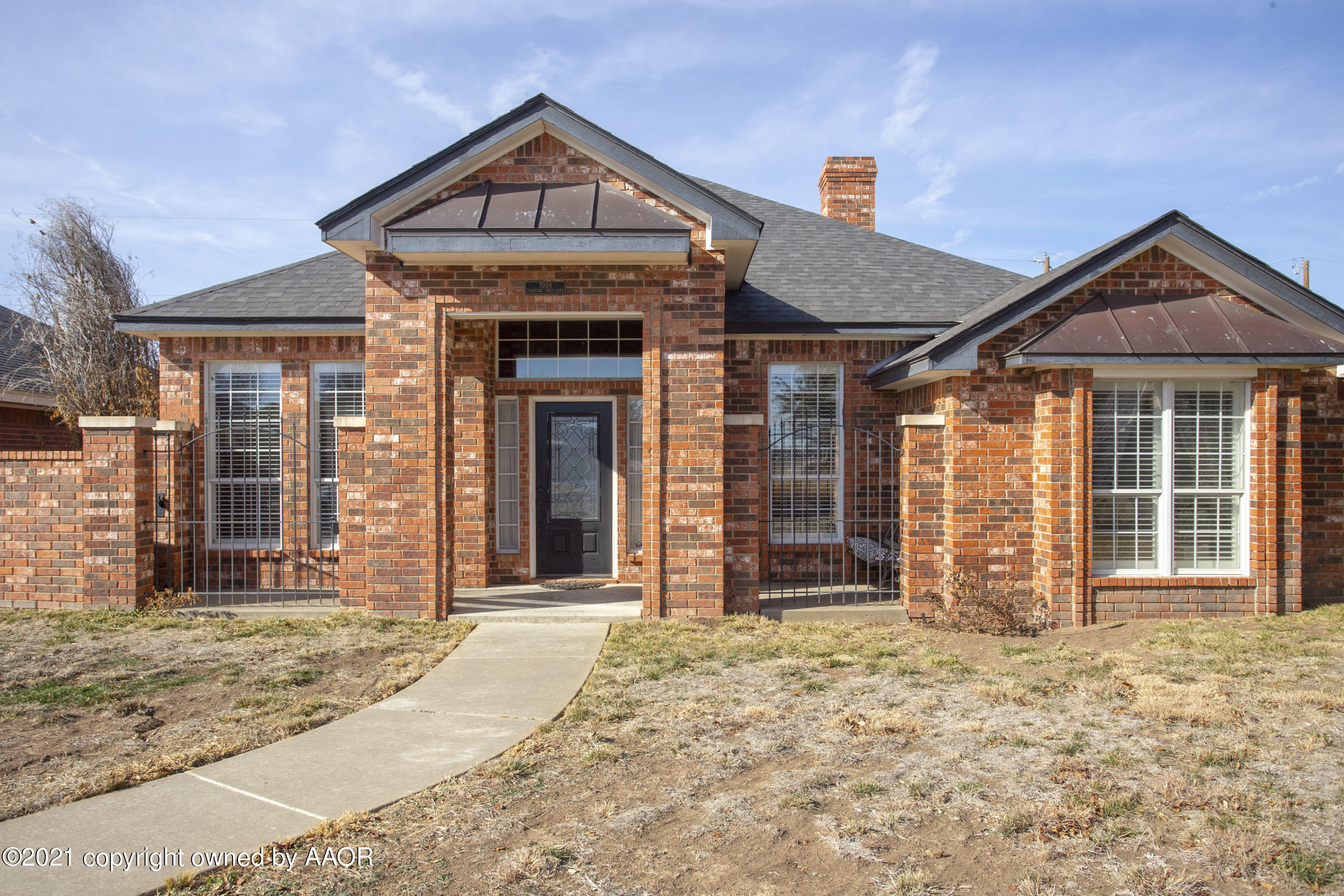 7008 Learning Tree Avenue Amarillo, TX 79119 - Photo 1 of 26 Front