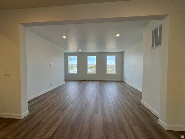 1883 West 1575th North, Unit 236 Layton, UT 84041 - Photo 11 of 22 Unfurnished room with dark wood-style flooring and recessed lighting