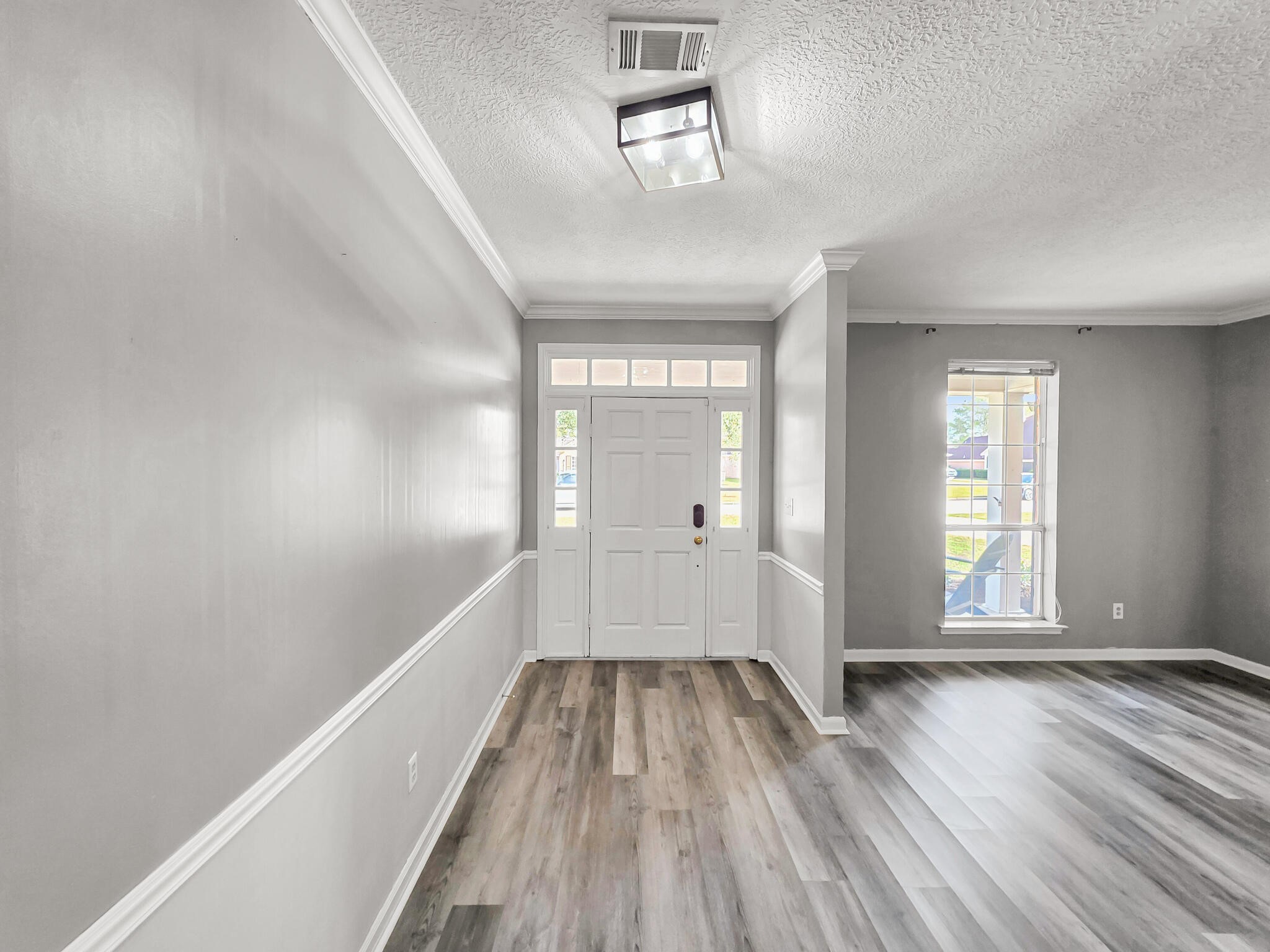 3910 Cypress Point Beaumont, TX 77707 - Photo 14 of 50 a view of hallway with window and wooden floor