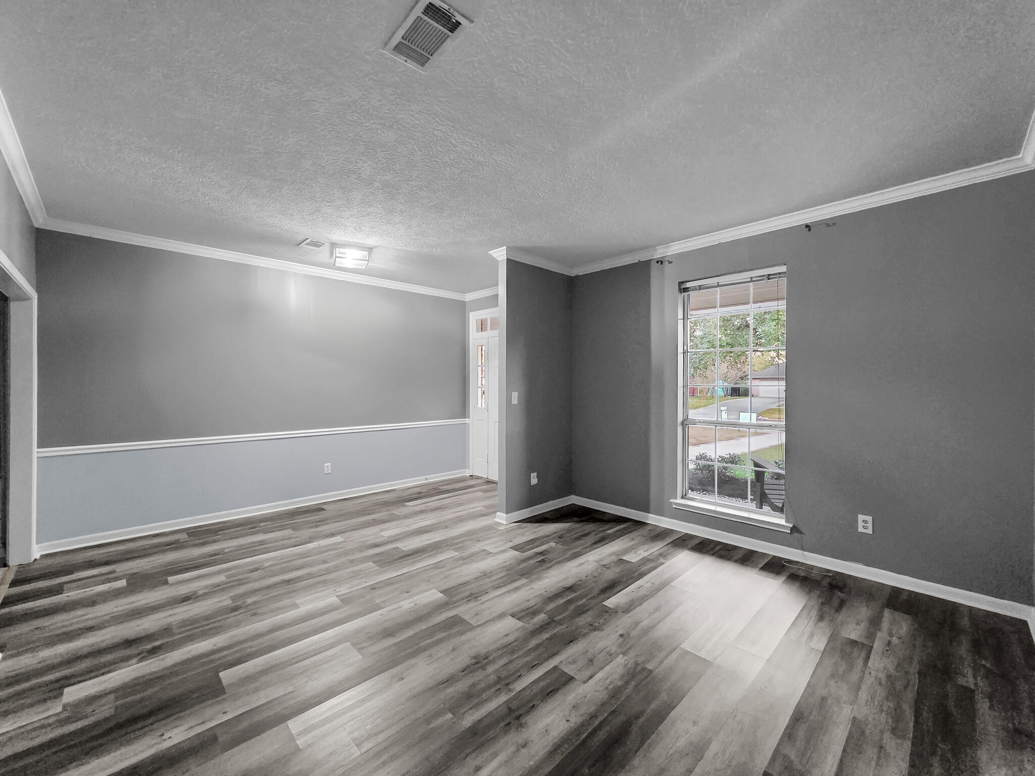 3910 Cypress Point Beaumont, TX 77707 - Photo 16 of 50 wooden floor in an empty room with a window
