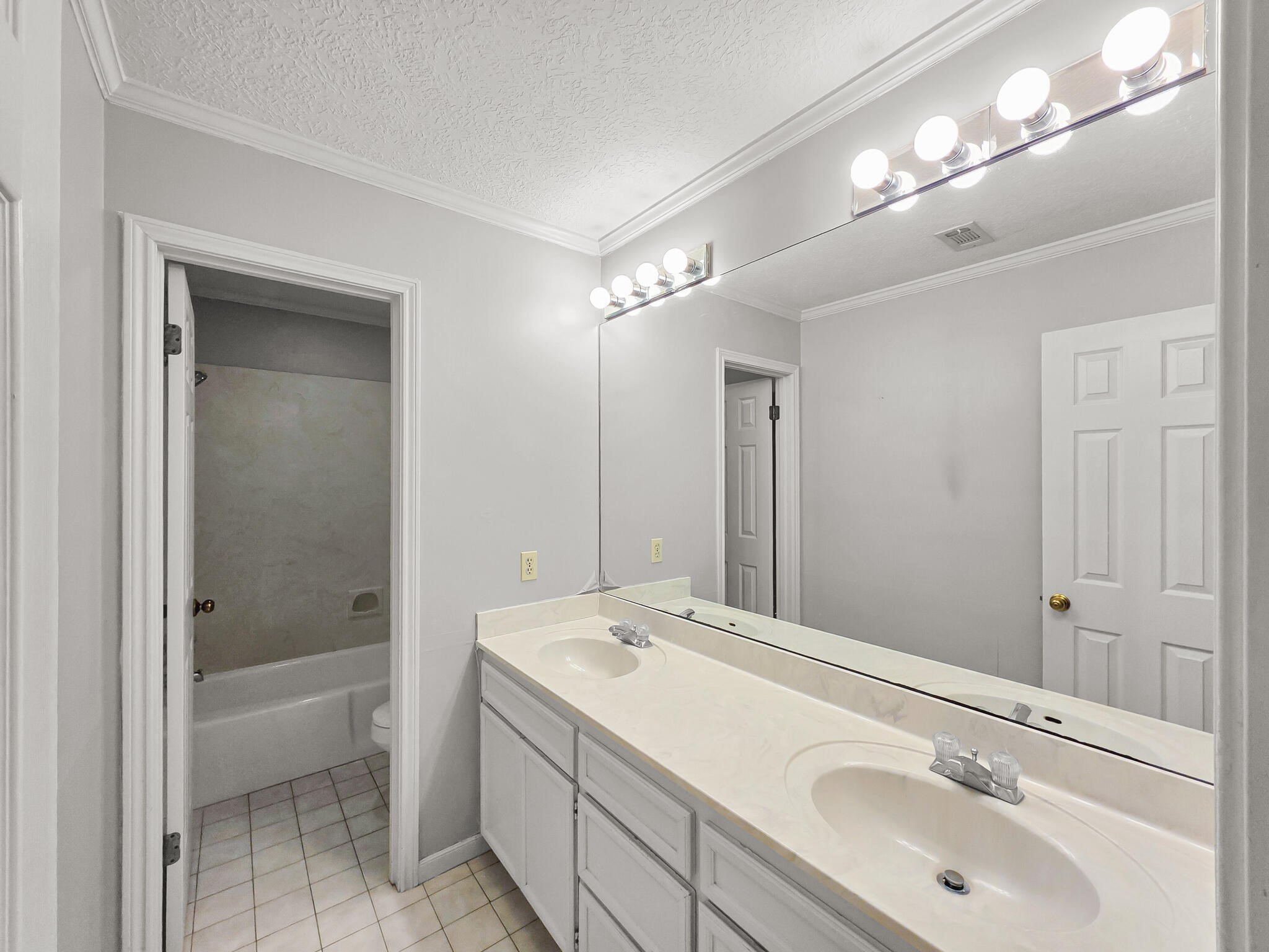 3910 Cypress Point Beaumont, TX 77707 - Photo 35 of 50 a bathroom with a sink a toilet and shower