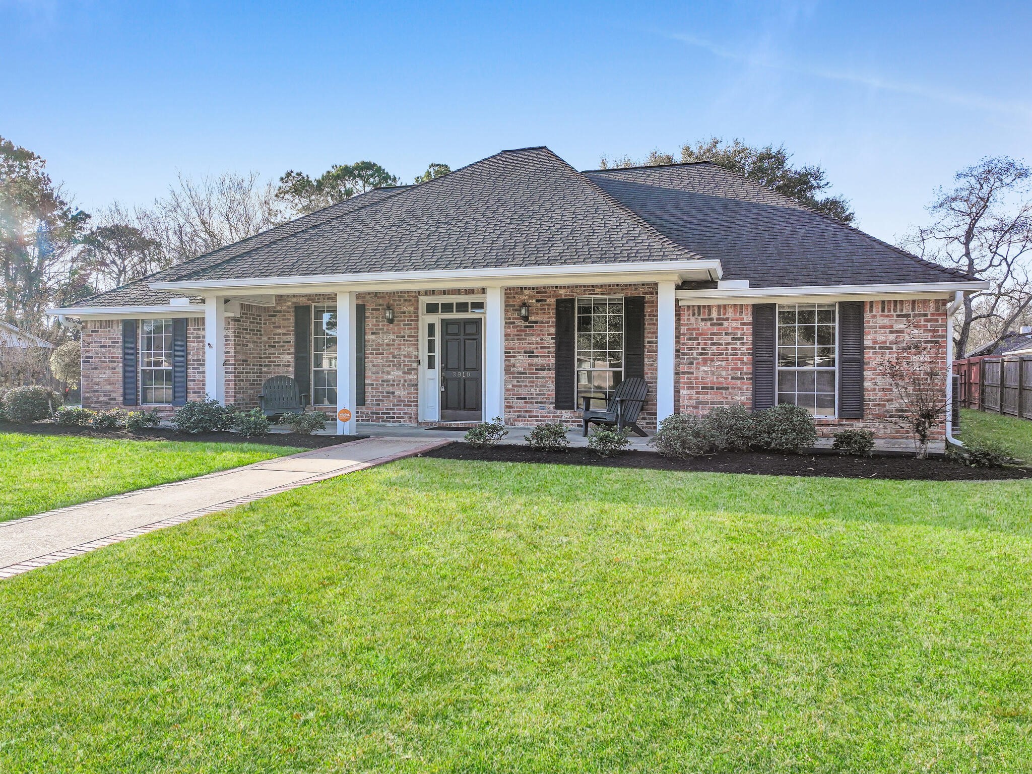3910 Cypress Point Beaumont, TX 77707 - Photo 50 of 50 a front view of a house with a yard and porch