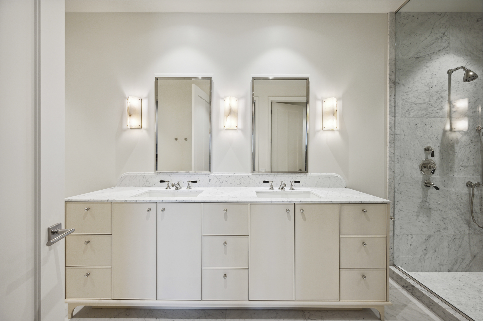 21 North May Street, Unit 1401 Chicago, IL 60607 - Photo 13 of 47 a bathroom with a sink and a mirror