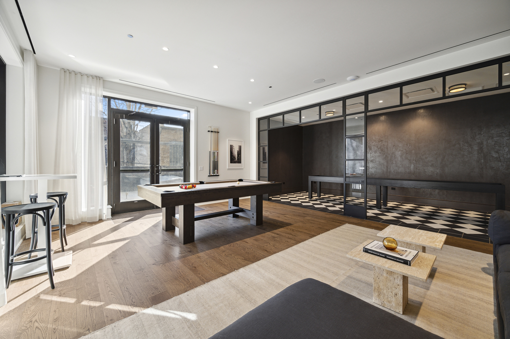 21 North May Street, Unit 1401 Chicago, IL 60607 - Photo 24 of 47 a living room with furniture and a flat screen tv