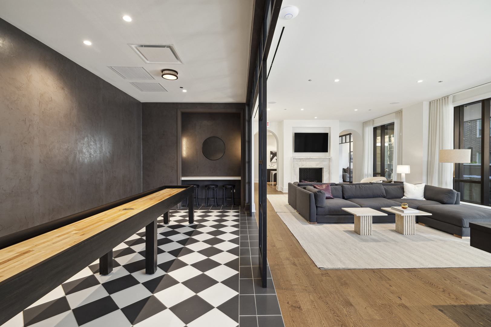 21 North May Street, Unit 1401 Chicago, IL 60607 - Photo 26 of 47 a living room with furniture and a flat screen tv