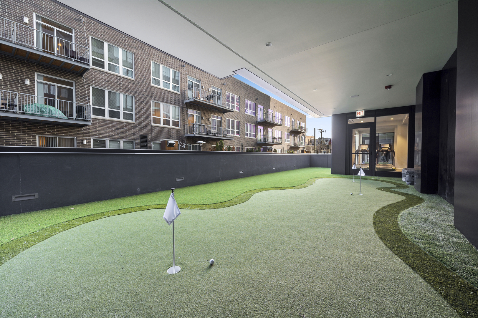 21 North May Street, Unit 1401 Chicago, IL 60607 - Photo 28 of 47 a house view with a garden space