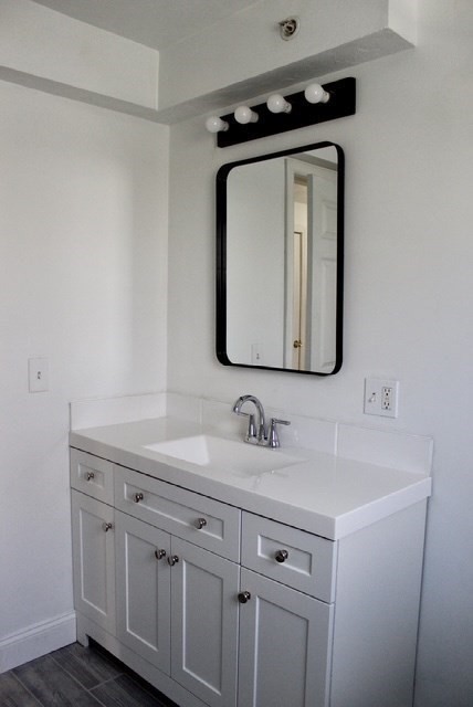 118 South Main Street, Unit 2 Freetown, MA 02702 - Photo 14 of 16 a bathroom with a sink vanity and toilet