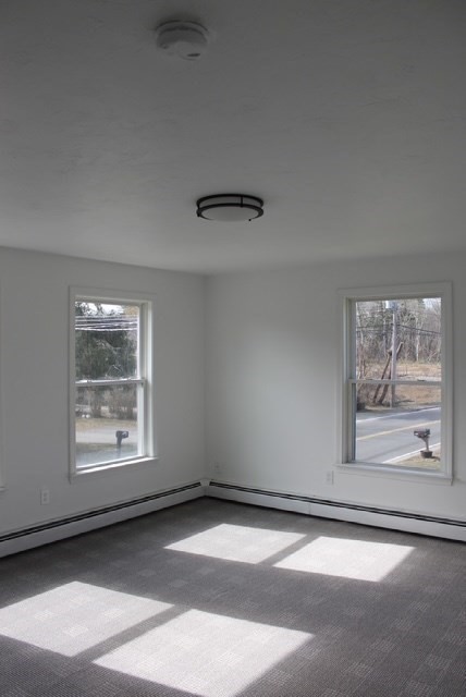 118 South Main Street, Unit 2 Freetown, MA 02702 - Photo 8 of 16 a view of an empty room with a window