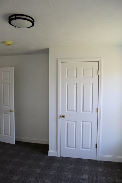118 South Main Street, Unit 2 Freetown, MA 02702 - Photo 10 of 16 an empty room with wooden floor