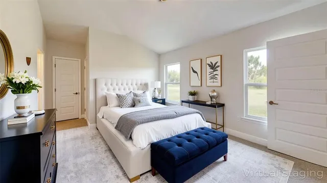 a bed room with a bed and a couch