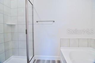 1772 Roberts Trail Bell, FL 32619 - Photo 15 of 26 a bathroom with a bathtub