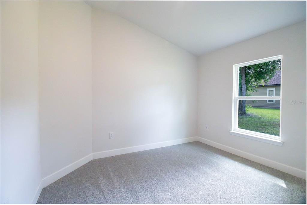 1772 Roberts Trail Bell, FL 32619 - Photo 17 of 26 an empty room with a window