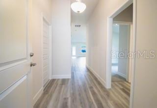 1772 Roberts Trail Bell, FL 32619 - Photo 22 of 26 a view of a bathroom from a hallway
