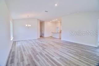 1772 Roberts Trail Bell, FL 32619 - Photo 8 of 26 a view of an empty room and wooden floor