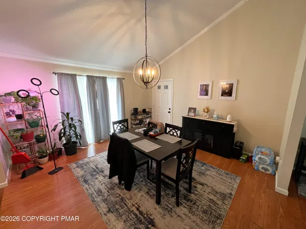 a view of a workspace with furniture