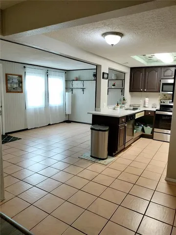 a bathroom with a bathtub and a toilet