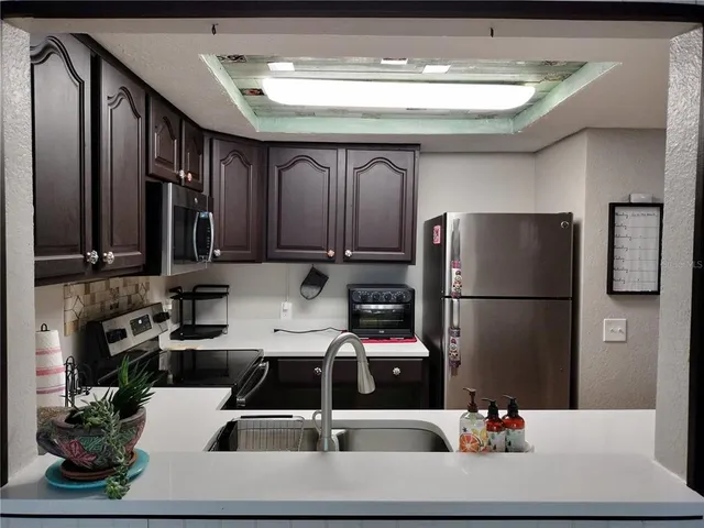 a view of a hardwood & floor to ceiling window