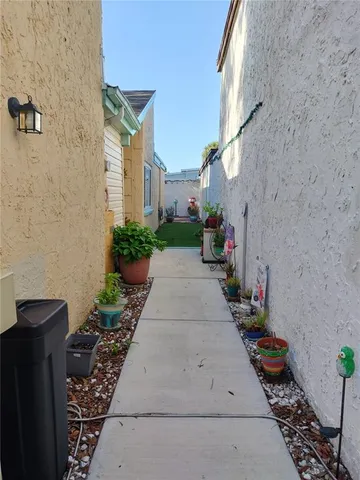 a view of outdoor space with wooden floor and window