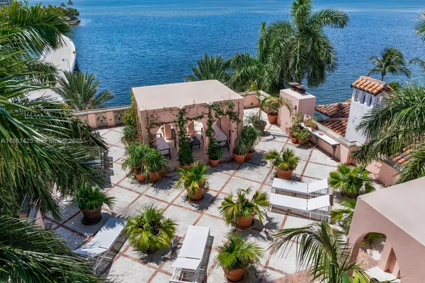 a view of hall way with furniture