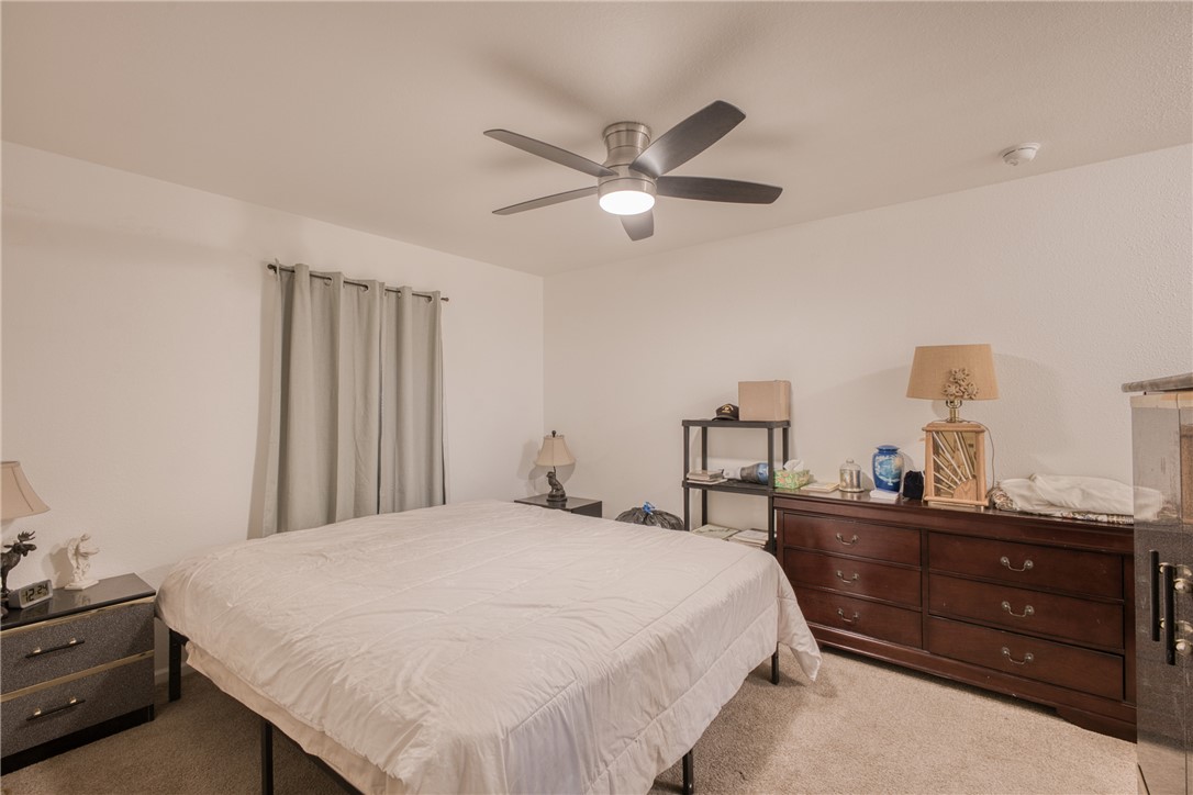 1855 Talc Road Bullhead City, AZ 86442 - Photo 9 of 23 Carpeted bedroom with ceiling fan