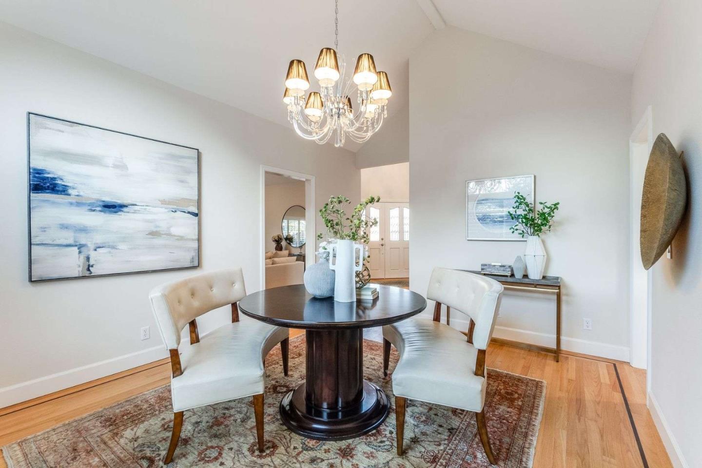 735 Sleeper Avenue Mountain View, CA 94040 - Photo 11 of 77 a dining room with furniture potted plants and wooden floor