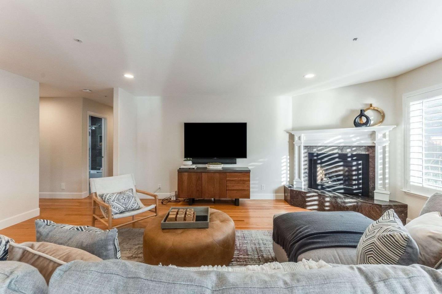 735 Sleeper Avenue Mountain View, CA 94040 - Photo 19 of 77 a living room with furniture and a flat screen tv