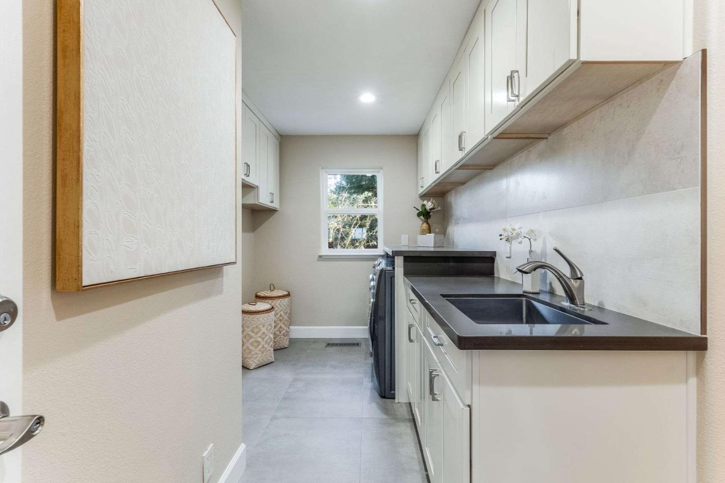 735 Sleeper Avenue Mountain View, CA 94040 - Photo 28 of 77 a kitchen that has a sink and a stove