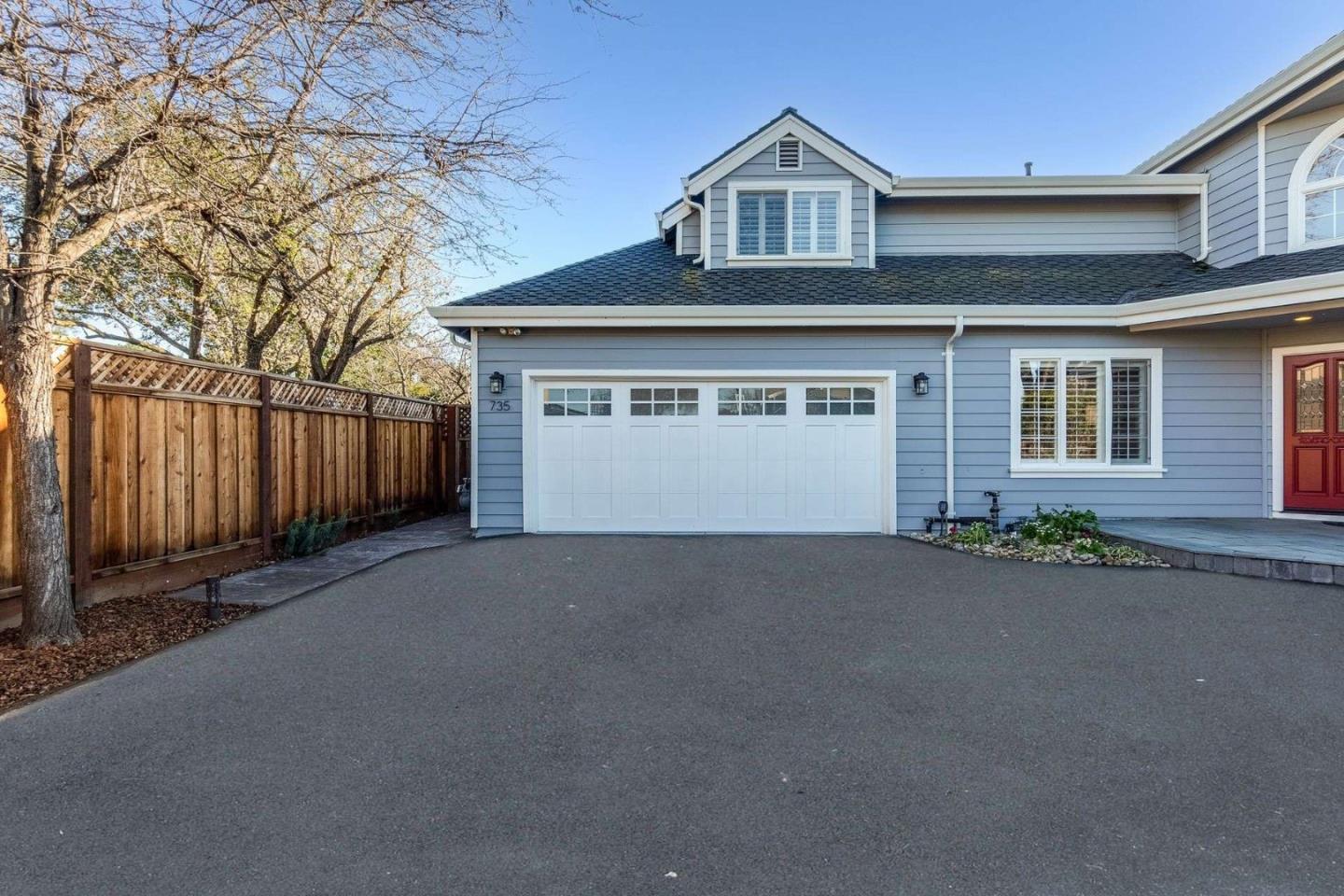 735 Sleeper Avenue Mountain View, CA 94040 - Photo 4 of 77 a front view of a house with a yard and garage