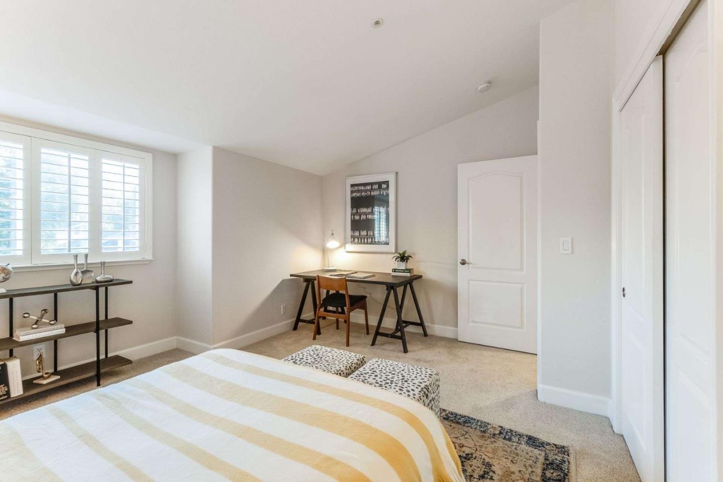 735 Sleeper Avenue Mountain View, CA 94040 - Photo 42 of 77 a bedroom with a bed and a table