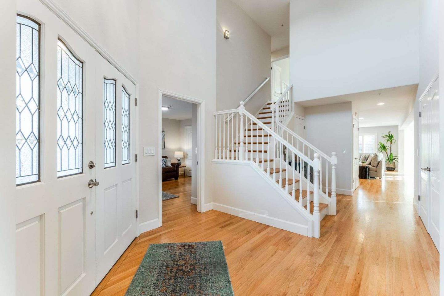 735 Sleeper Avenue Mountain View, CA 94040 - Photo 6 of 77 a view of a hallway view with wooden floor and staircase