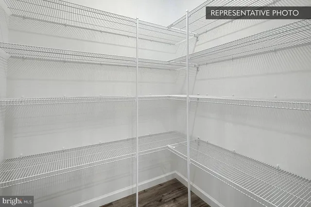 a view of a room with racks on the wall