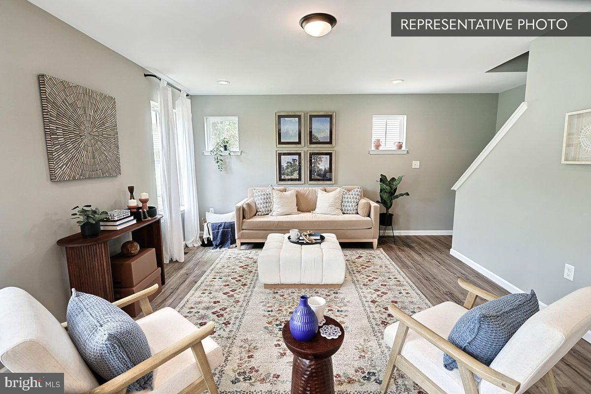 Sweet Birch Plan At Hills Spring Grove, PA 17362 - Photo 23 of 47 a living room with furniture a rug and a table
