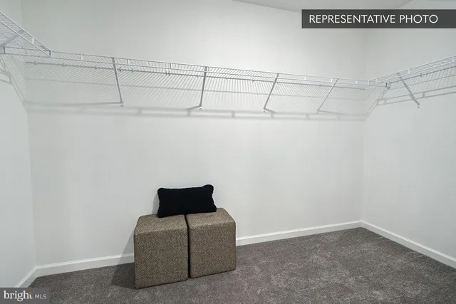 a view of a room with racks on the wall