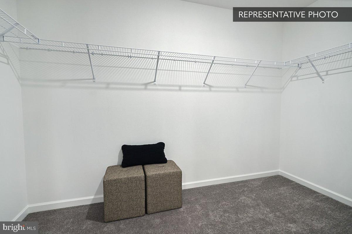 Sweet Birch Plan At Hills Spring Grove, PA 17362 - Photo 29 of 47 a view of a room with racks on the wall