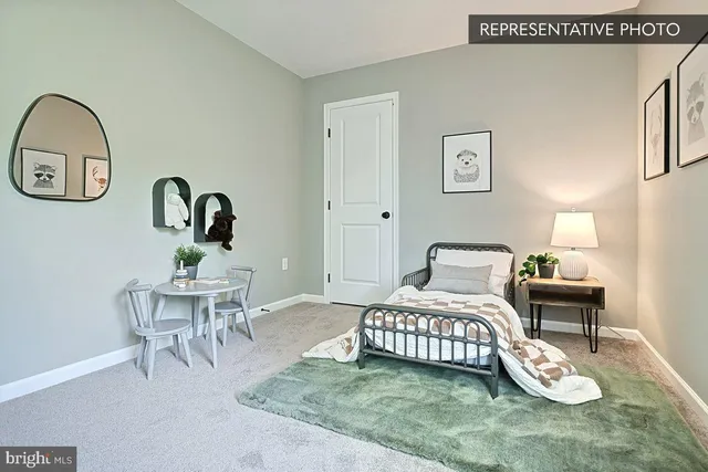 a bedroom with a bed and a table