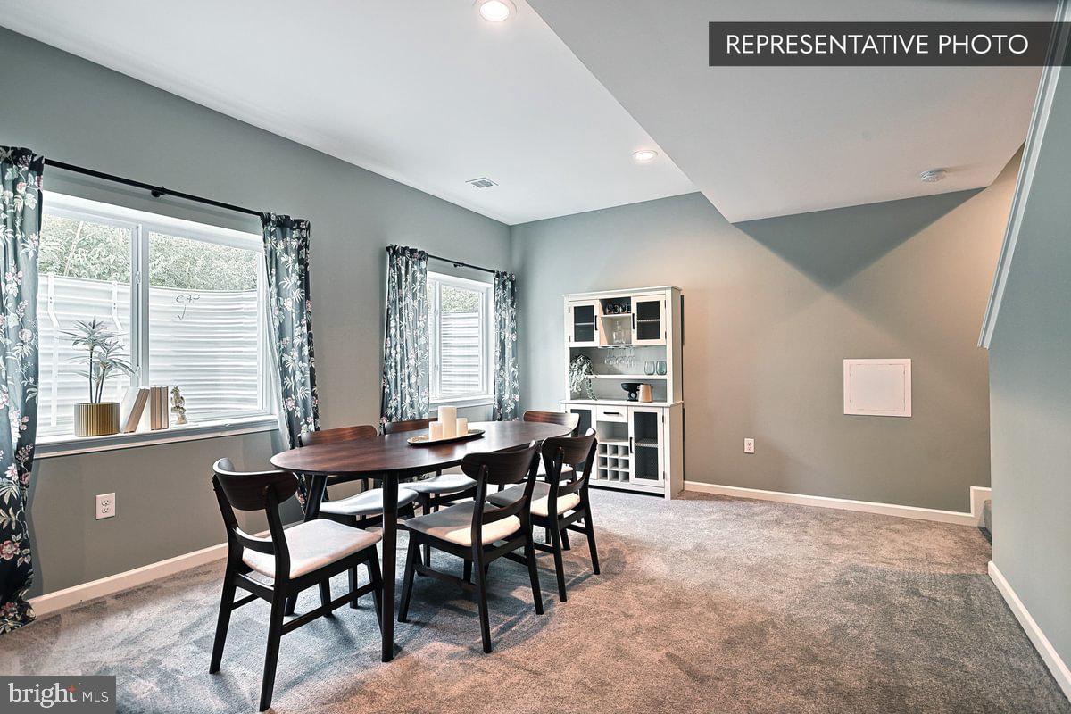 Sweet Birch Plan At Hills Spring Grove, PA 17362 - Photo 43 of 47 a view of a dining room with furniture and a window