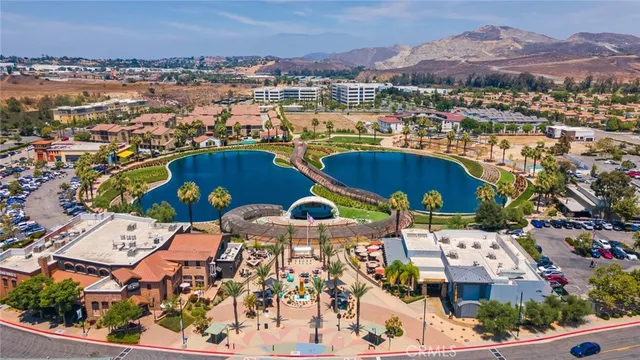 an aerial view of a house with a garden