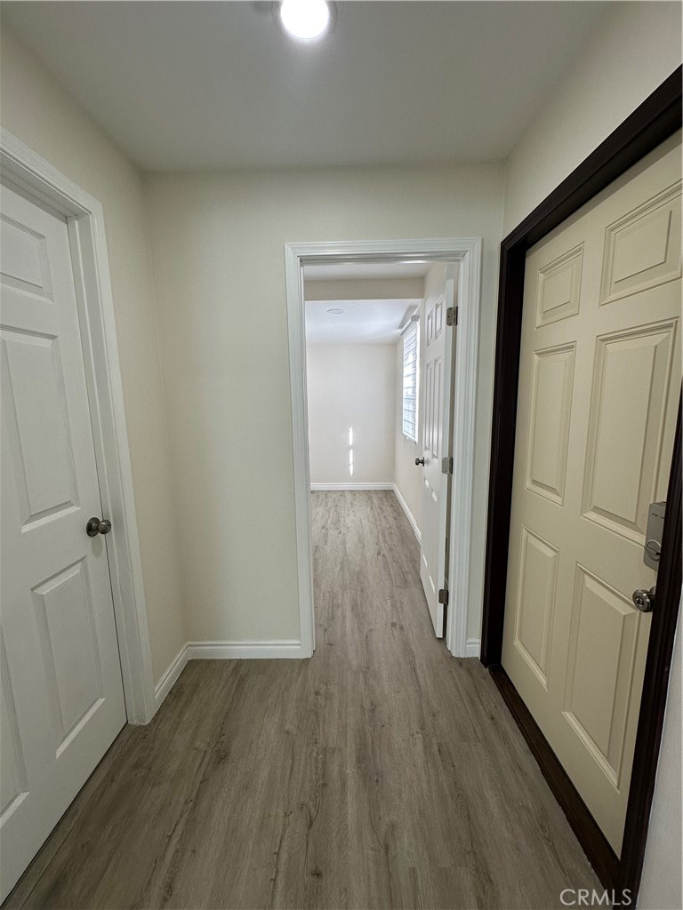 20655 Lemmer Street Chatsworth, CA 91311 - Photo 14 of 25 wooden floor in an empty room