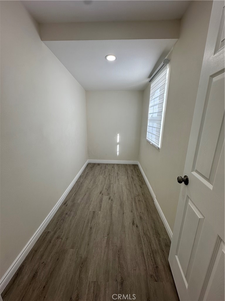 20655 Lemmer Street Chatsworth, CA 91311 - Photo 15 of 25 wooden floor in an empty room with a window