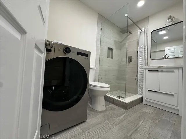 a bathroom with a toilet and a sink