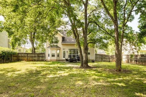 a view of a house with a swimming pool