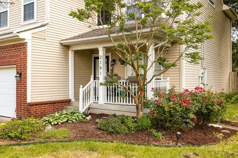 a front view of a house having yard