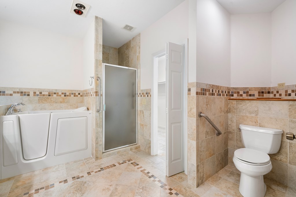 399 Hideaway Hills Road Blairsville, GA 30512 - Photo 42 of 77 a bathroom with a toilet and a shower