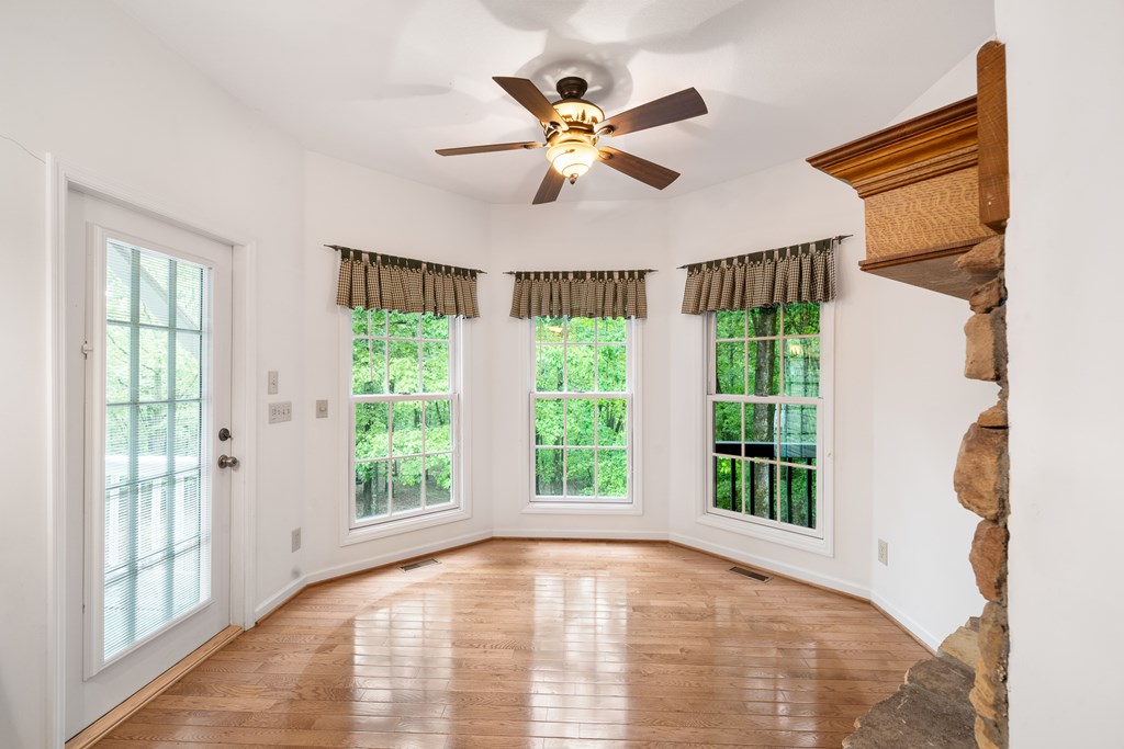 399 Hideaway Hills Road Blairsville, GA 30512 - Photo 46 of 77 a view of an empty room with a window